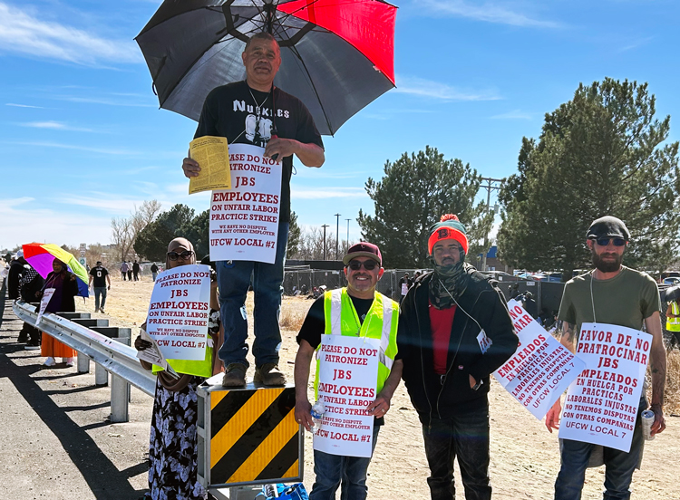 UFCW members on strike at JBS in Greeley, Colorado, March 18. Eisrael Mendez, with umbrella, is a trainer of new hires. “There are many injuries that can be prevented,” he said.