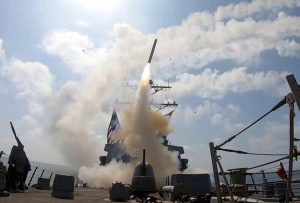 Cruise missiles launched from U.S. warship against targets in Iran Feb. 28. Washington says its massive bombardment hit over 5,500 sites, including 60 Iranian warships by March 11.