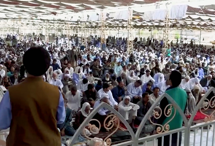 Thousands attend Friday sermon by Sheik Abdul-Hamid in Zahedan, Iran, March 13, in middle of the war. The Sunni and Baluchi leader called for freeing all political prisoners in Iran.