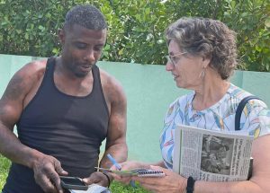 “I’ve never heard anyone talk about a party for workers,” mechanic Dougera Illarion told Rachele Fruit, SWP candidate for U.S. Senate, in Miami April 12. He got a Militant subscription.