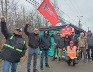 Striking Grocery Workers Union members at Metro supermarket chain in Montreal welcome solidarity delegation of rail conductors at Canadian National, members of Teamsters, April 15.