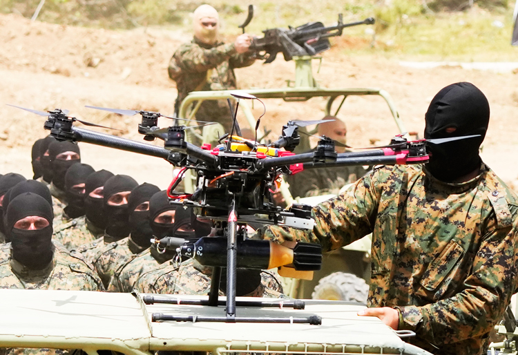 Hezbollah fighters in southern Lebanon in 2023. Washington is pushing Israel to halt attacks on Hezbollah, seeking stability to advance U.S. rulers’ exploitation of resources, labor in region.