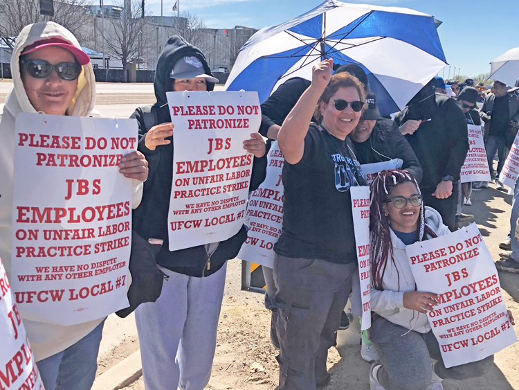 Demanding wages that keep up with inflation, safety on the job, end to abuse, members of UFCW Local 7 mount mass pickets in third week of strike at JBS in Greeley, Colorado.