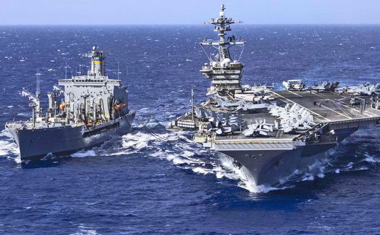 USS Abraham Lincoln, above right, leads one of three U.S. carrier strike groups in Middle East as Washington blockades boats from Iran’s ports, threatens escalation, seeks new negotiations.