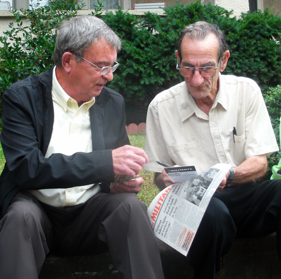 John Benson, left, shows Militant to Leonard Childress in Metropolis, Illinois, Oct. 12, 2014. Benson was always eager to find out what workers thought and had a passion to discuss the party’s program.