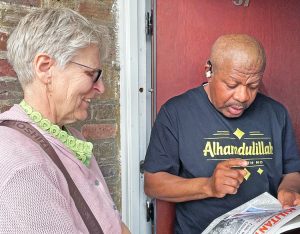 “Building unions is key,” Michale Lawal told Communist League member Julie Crawford in London May 3. He got a Militant subscription, made contribution to the Militant Fighting Fund.