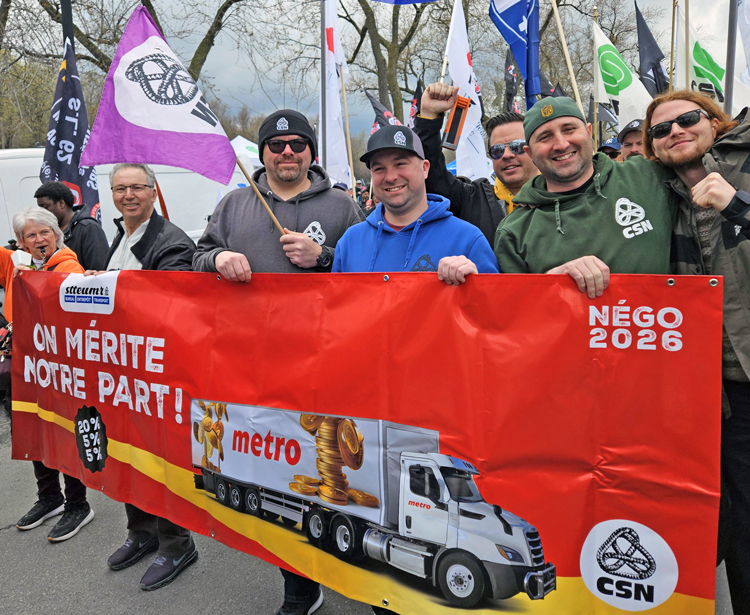 Striking workers, drivers at Metro supermarket chain, fighting for a better contract, joined with several thousand rail, postal and other workers at May Day action in Montreal May 2.