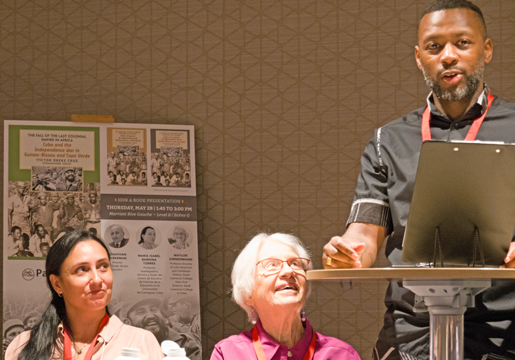 Presentation of Víctor Dreke’s Cuba and the Independence War in Guinea-Bissau and Cape Verde. From left, María Isabel Bardina of Cuba’s Camagüey University; chair Matilde Zimmermann; Wilson da Graça Robalo, of Federation of Cape Verdean Associations of France.