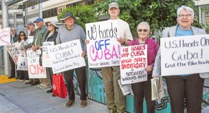 SWP candidates are helping to lead “U.S. hands off Cuba!” protests around the country and around the world. Above right, Margaret Trowe, SWP candidate for California governor, joined action in Oakland June 3. Below, SWP candidate Naomi Craine for U.S. Senate in Illinois spoke at Chicago protest of over 100 people June 3, including many onlookers stopping to listen.