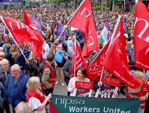 Northern Ireland Public Service Alliance union contingent joins June 13 protest in Belfast against anti-immigrant riots. U.K. parties of all stripes are pushing crackdown on immigration.
