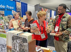 The Pathfinder booth at the American Library Association conference June 25-29 drew wide interest. More than 75 librarians signed up for more information, 114 books were purchased.