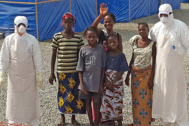 Cuban medical workers with patients being discharged after treatment for Ebola in the Coyah region of Guinea, Jan. 19, 2015. Their selfless work was a product of Cuba’s internationalism.