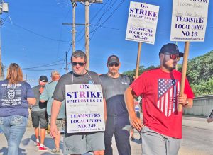 Teamsters Local 249 members picket Heidelberg Materials concrete plant in Pittsburgh July 13. They’re on strike for a pay raise, to defend seniority rights and against boss harassment.