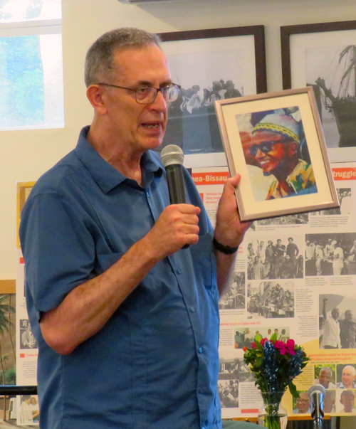 Martín Koppel, co-editor of the book, presented the museum with a portrait of Cabral that had been part of mural on Pathfinder building in New York in the 1980s.