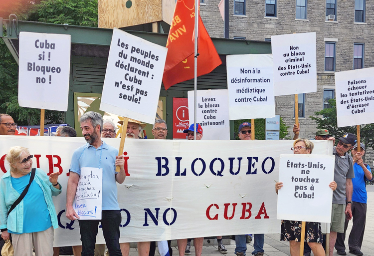 Some 30 protesters joined Quebec-Cuba Solidarity Roundtable picket in Montreal June 30. Signs in French included, “Washington and Ottawa hands off Cuba, lift the blockade!”
