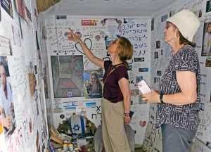 SWP member Rachele Fruit, right, and CL member Ólöf Andra Proppé view bus stop near Re’im kibbutz, where 27 people seeking refuge Oct. 7, 2023, were murdered by Hamas thugs.