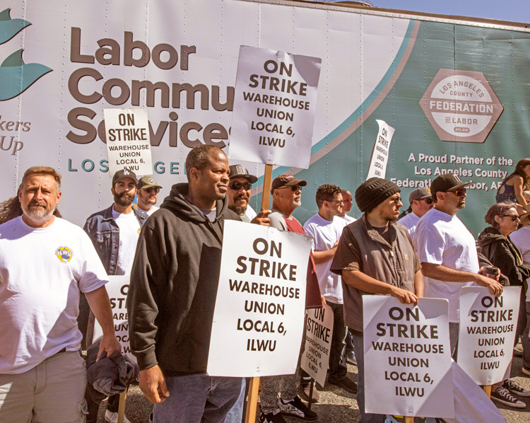 Striking members of ILWU Local 6 at C&H Sugar in Crockett, California, receive six pallets of essential aid, including food, in solidarity from Los Angeles Labor Council June 30.