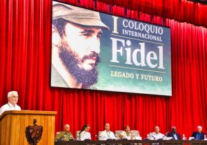 René González Barrios, director of Fidel Castro Ruz Center, opens First International Fidel Colloquium: Legacy and Future, in Havana Aug. 10. On far right of panel is Cuban President Miguel Díaz-Canel.