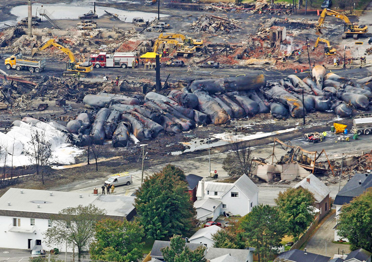 Devastated town of Lac-Mégantic, Quebec, July 8, 2013, two days after runaway train derailed, exploded, killing 47 people. Bosses’ profit drive is cause of deadly “accidents” on the rails today.