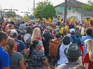 Demonstrators gather July 8 at street in Houston where Lorenzo Salgado Araujo was fatally shot day before by ICE agents. Protests over justice for Salgado, immigrant workers, continue.