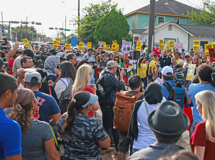 Demonstrators gather July 8 at street in Houston where Lorenzo Salgado Araujo was fatally shot day before by ICE agents. Protests over justice for Salgado, immigrant workers, continue.