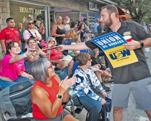 United Steelworkers Local 7-1 members, locked out by BP in Whiting, Indiana, marched in the Pierogi Fest Parade there July 24. Thousands applauded workers and took posters home.