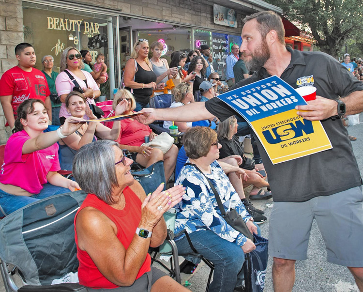 United Steelworkers Local 7-1 members, locked out by BP in Whiting, Indiana, marched in the Pierogi Fest Parade there July 24. Thousands applauded workers and took posters home.