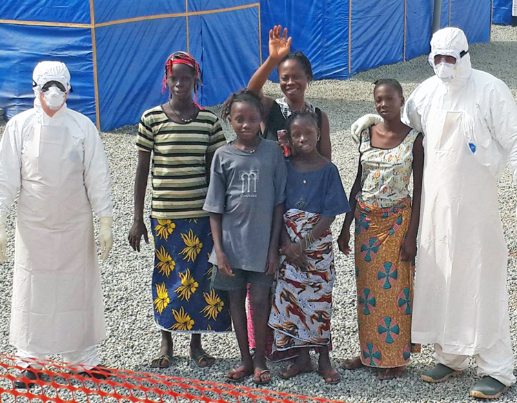 Cuban medical workers with patients after they’d been treated for Ebola, in Guinea, Jan. 19, 2015. Hundreds of Cubans volunteered to help. Today, with 3,500 Ebola deaths in Democratic Republic of the Congo, almost no help has come from the U.S. and Cuban help is barred.