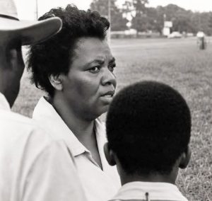Standing up to racist harassment and violence, Laura McGhee, above, opened her small farm outside Greenwood, Mississippi, to SNCC campaigners and others for rallies and meetings during the 1964 Freedom Summer campaign to build the movement, deal blows to Jim Crow.