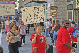 Over 100 unionists joined UNITE HERE Local 8 striking hotel workers in front of Embassy Suites in Seattle Aug. 20. Workers rejected bosses’ offer of paltry 40 cents wage increase.