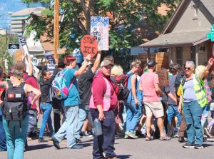 Students march and rally in Denver Sept. 4 after walking out of class at more than 200 high schools in Colorado to demand a halt to ICE raids, construction of new ICE detention centers.