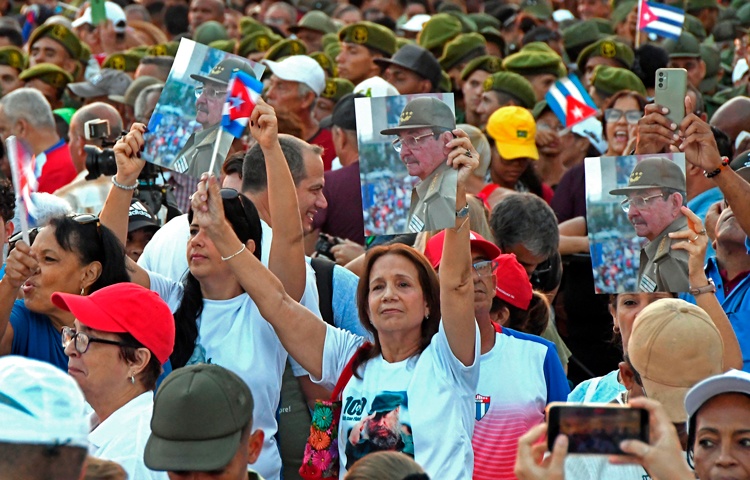 People hold images of Raúl Castro, leader of Cuban Revolution, as thousands rallied in Havana May 22 to protest Washington’s oil blockade of Cuba and to defend their socialist revolution.