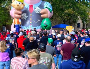 International Brotherhood of Electrical Workers members rally at Duquesne Light’s Woods Run facility in Pittsburgh Oct. 7 during strike over work hours, safety and union rights.