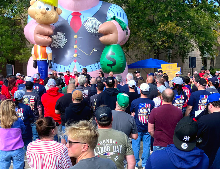 International Brotherhood of Electrical Workers members rally at Duquesne Light’s Woods Run facility in Pittsburgh Oct. 7 during strike over work hours, safety and union rights.