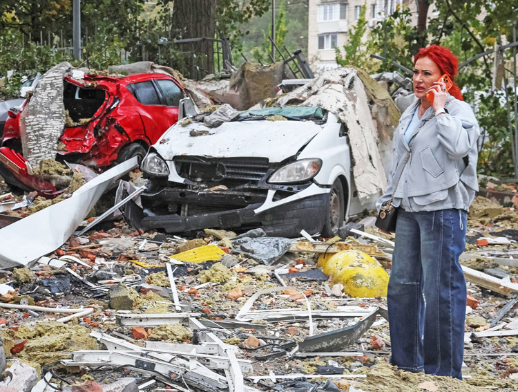 Apartment building in Kyiv, Ukraine, shattered by Russian drone attacks Oct. 21. As winter nears, Russian President Vladimir Putin targets pedestrians, housing and power plants.