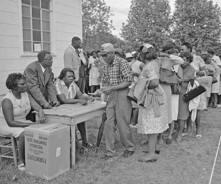 African American workers and farmers, members of Lowndes County Freedom Organization, meet in Hayneville, Alabama, May 3, 1966, to elect party nominees for coming local elections.