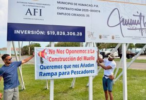 Fishermen put up sign Sept. 10, the day before Puerto Rico Gov. Jenniffer González came to Punta Santiago to announce plans to begin construction of a $20 million pier. “We don’t oppose constructing the pier,” the sign says. “We want you to add a ramp for the fishermen.”