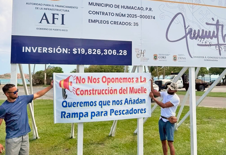 Fishermen put up sign Sept. 10, the day before Puerto Rico Gov. Jenniffer González came to Punta Santiago to announce plans to begin construction of a $20 million pier. “We don’t oppose constructing the pier,” the sign says. “We want you to add a ramp for the fishermen.”