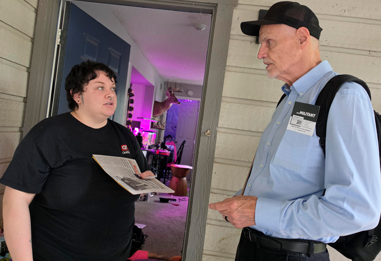 Dennis Richter, SWP candidate for U.S. Senate from Texas, speaks to Sage Arnold Oct. 4. She said, “There are real challenges trying to raise a family” with costs of groceries, housing today.