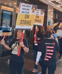 Striking members of UNITE HERE Local 1 picket the Palmer House Hilton in downtown Chicago Loop Oct. 13.